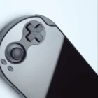 Anbernic RG Vita vista frontal con doble joystick analógico y botones estilo consola clásica